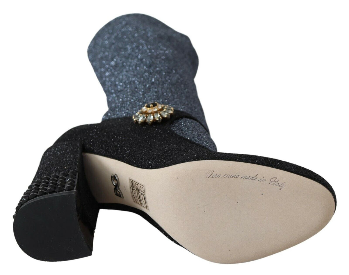 Black crystal Mary Jane booties shoes by Dolce & Gabbana with rounded toe and strap, stylishly displayed on a white background.