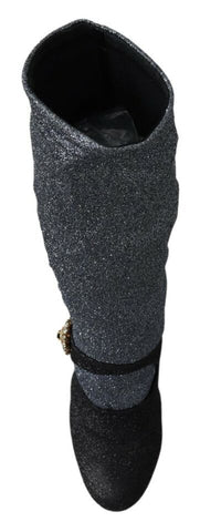 Black crystal Mary Janes booties shoes by Dolce & Gabbana with shiny crystal embellishments and classic Mary Jane strap design.