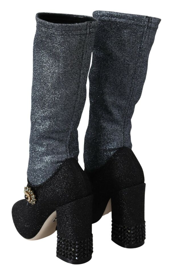 Black crystal Mary Janes booties shoes by Dolce & Gabbana with glossy finish and decorative crystal accents on the straps.