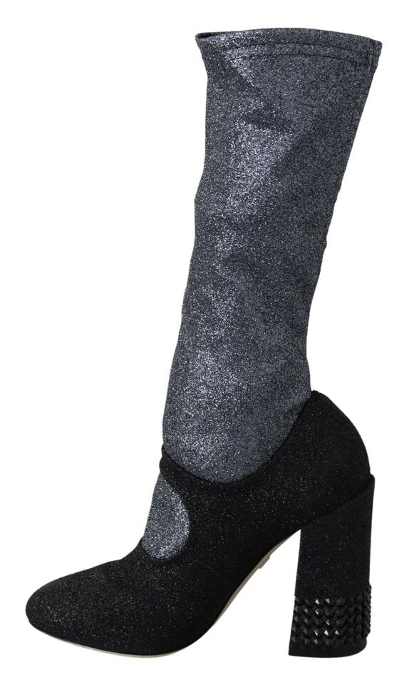 Black crystal Mary Jane booties by Dolce & Gabbana featuring a classic strap and glossy finish on stylish footwear.