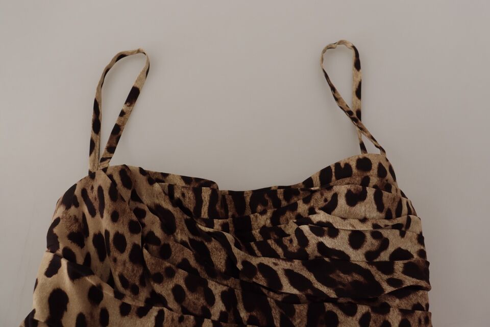 Brown leopard print ruched midi dress by Dolce & Gabbana, featuring a fitted silhouette and stylish design.