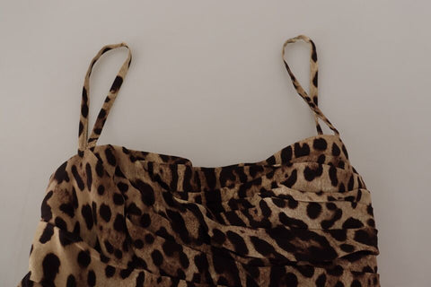 Brown leopard print ruched midi dress by Dolce & Gabbana, featuring a fitted silhouette and stylish design.