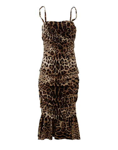 Brown leopard print ruched midi dress by Dolce & Gabbana, showing the fitted silhouette and ruched details.