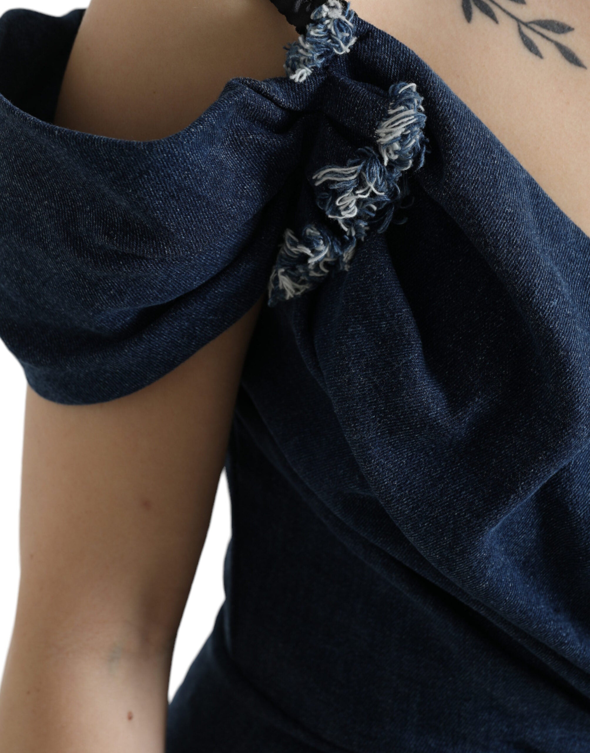 Blue patchwork two-tone denim mini dress by Dolce & Gabbana, featuring a fitted silhouette and stylish design.