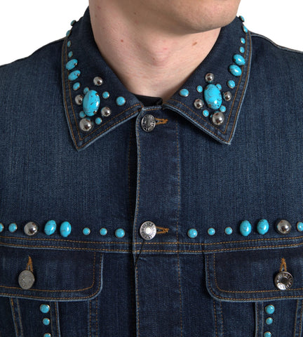 Blue denim jacket by Dolce & Gabbana with turquoise stones and studded details, featuring a stylish, casual design.