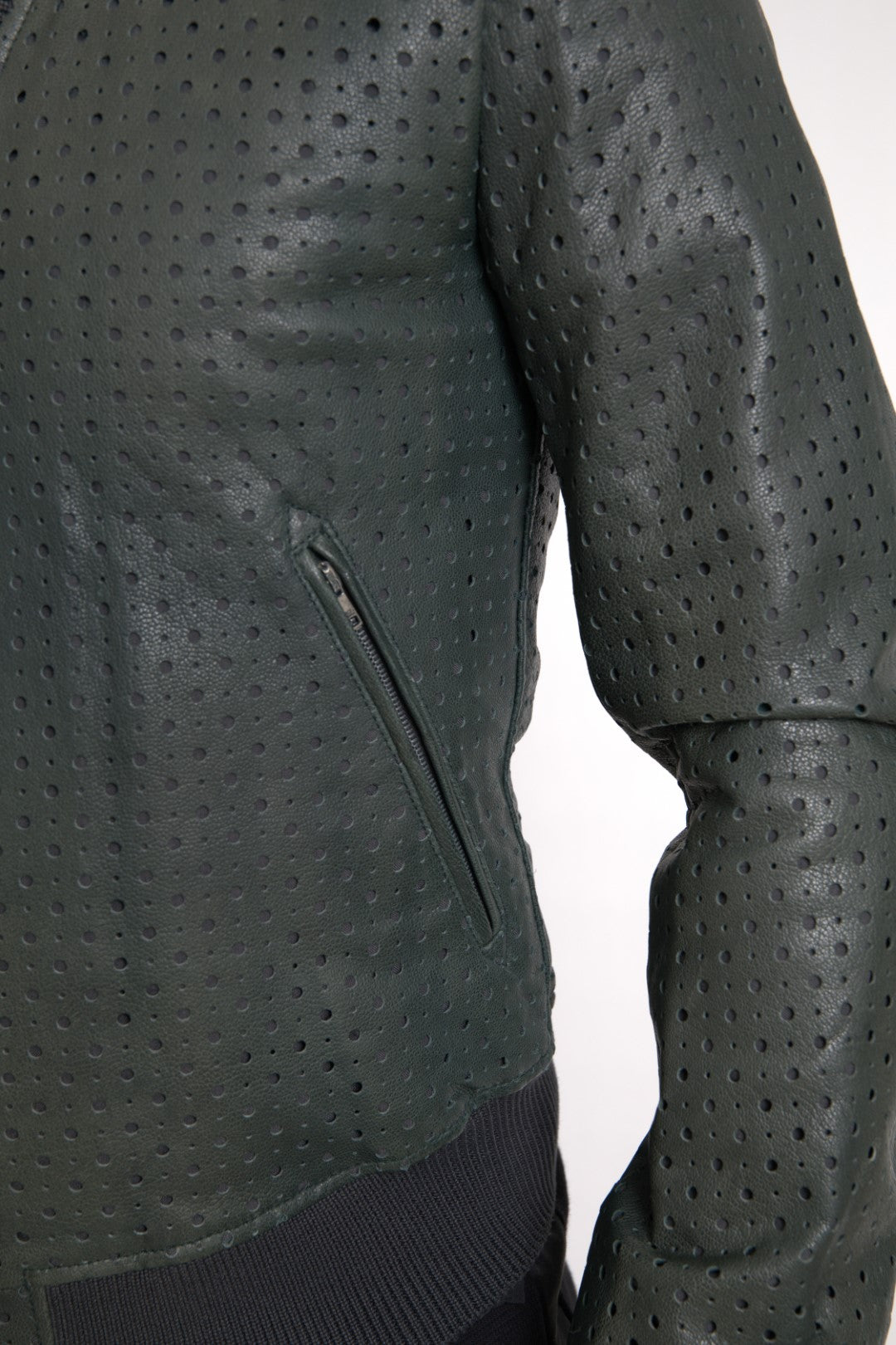 Green perforated leather bomber jacket by Dolce & Gabbana, shown with a front view highlighting the textured design and stylish fit.