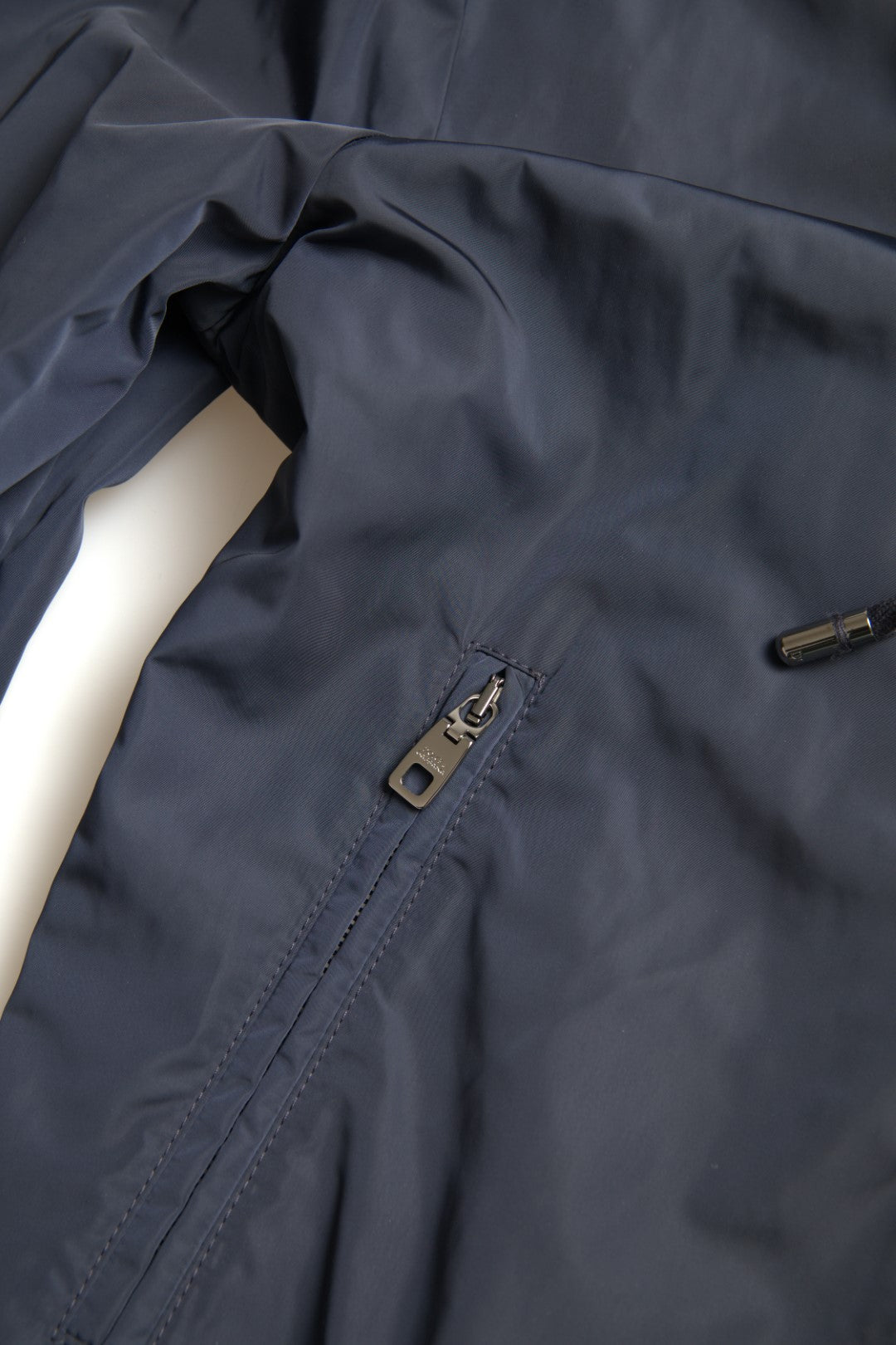 Blue Dolce & Gabbana hooded logo polyester full-zip sweater with front pockets and ribbed cuffs, casual and stylish.
