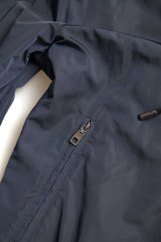 Blue Dolce & Gabbana hooded logo polyester full-zip sweater with front pockets and ribbed cuffs, casual and stylish.