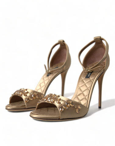 Gold satin ankle strap crystal sandals by Dolce & Gabbana with elegant design and shimmering embellishments.