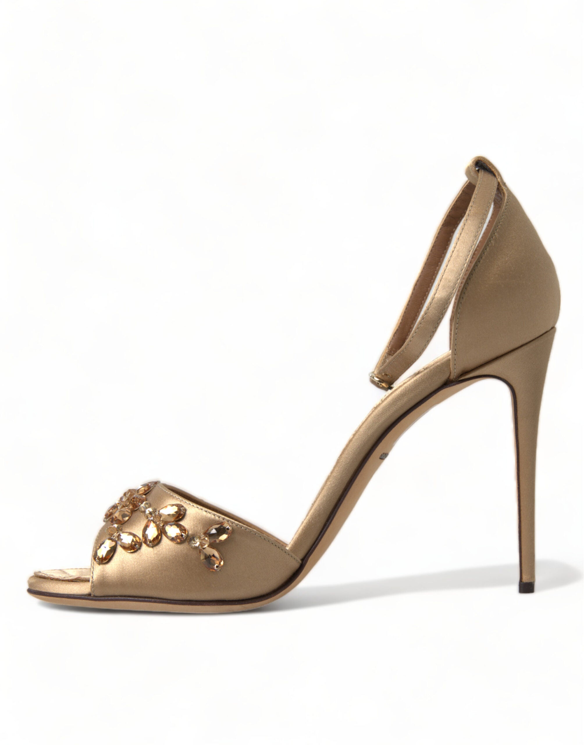 Gold satin ankle strap crystal sandals by Dolce & Gabbana with elegant heel and sparkle details.
