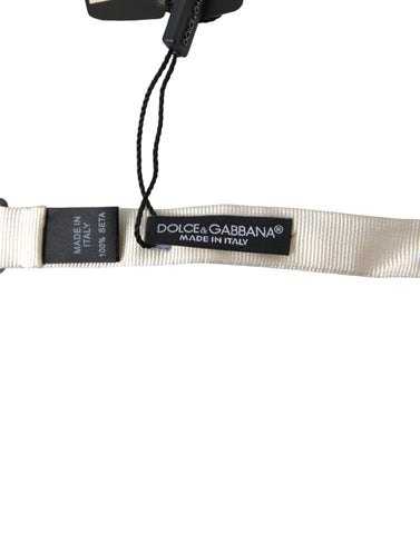 White silk slim adjustable Papillon bow tie by Dolce & Gabbana, featuring a classic butterfly shape and elegant design.