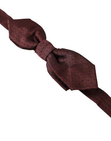 Red Bordeaux silk slim adjustable bow tie with classic butterfly shape, designed by Dolce & Gabbana.