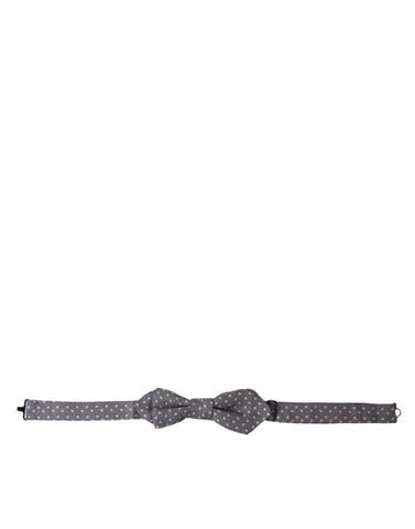 Gray polka dot silk adjustable neck bow tie by Dolce & Gabbana, featuring a stylish and elegant design.