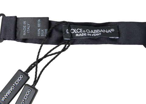 Dark blue silk satin adjustable neck bow tie for men, styled as a luxurious Dolce & Gabbana papillon bow tie.