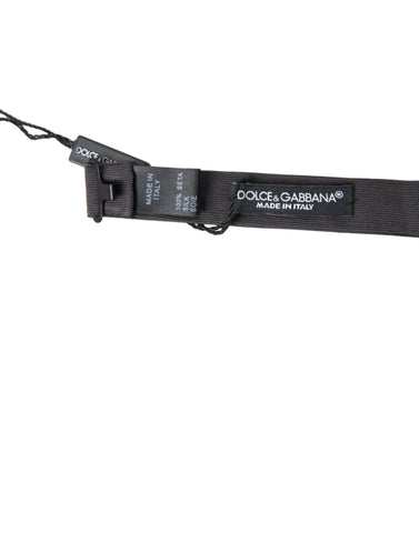 Dark gray silk adjustable men's bow tie with papillon style from Dolce & Gabbana, featuring a classic and elegant design.