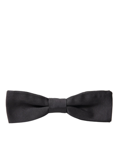 Dark gray silk adjustable men's bow tie with papillon style from Dolce & Gabbana, featuring a sleek and elegant design.