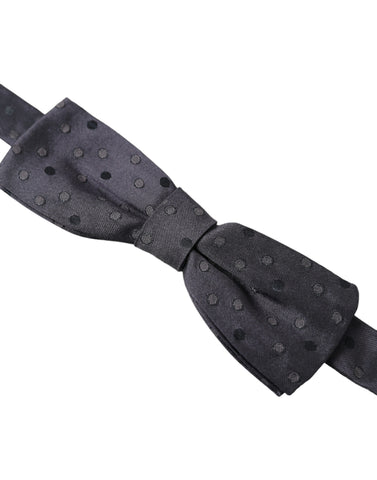 Blue polka dot silk adjustable bow tie for men by Dolce & Gabbana, featuring a classic papillon style with a stylish neck tie design.