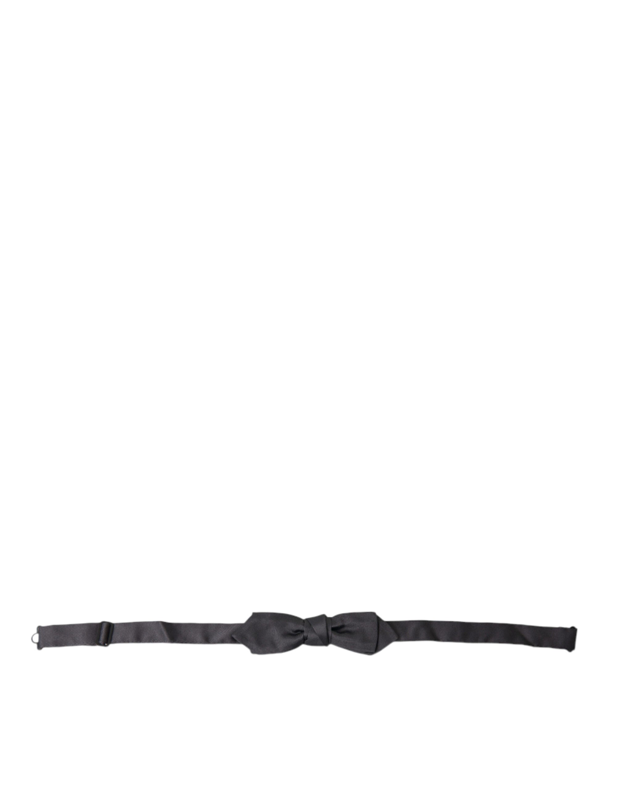 Dark gray silk adjustable men's bow tie with papillon style from Dolce & Gabbana, shown with a classic knot and smooth fabric.