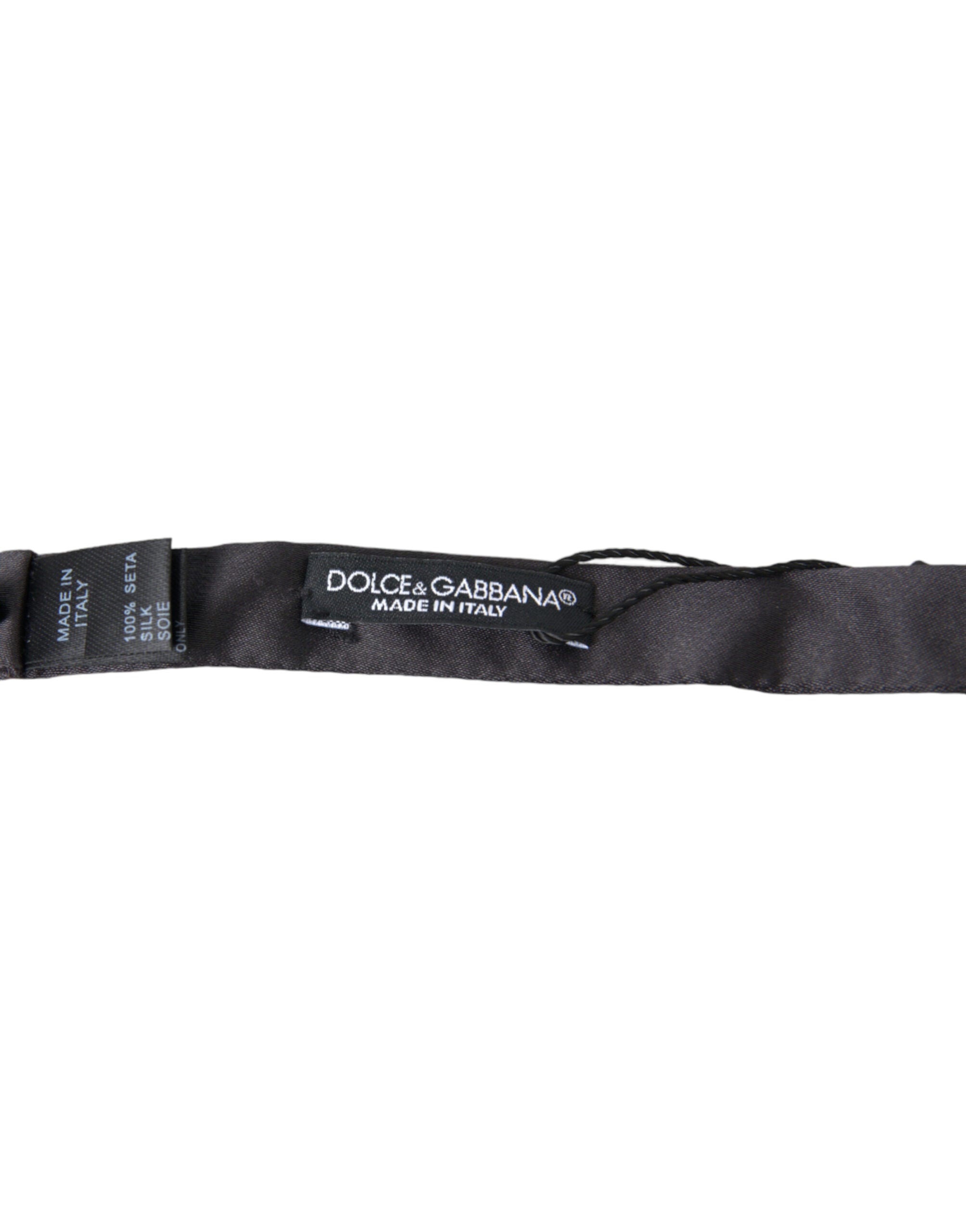 Dark gray silk adjustable men's bow tie featuring a papillon style, from Dolce & Gabbana, with a classic and elegant design.