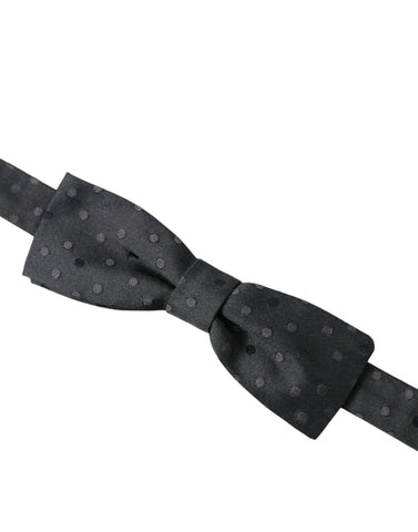 Gray polka dot silk adjustable neck bow tie for men by Dolce & Gabbana, featuring classic polka dot pattern and elegant style.