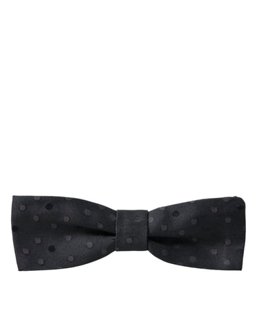 Gray silk polka dot bow tie with adjustable neck strap for men by Dolce & Gabbana, featuring a classic papillon style.