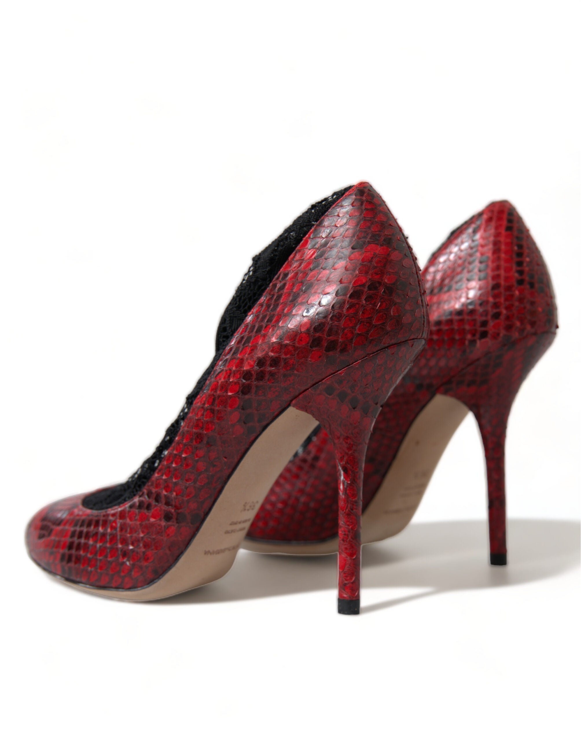 Red leather lace-up pumps by Dolce & Gabbana featuring a sleek design and classic pump silhouette.