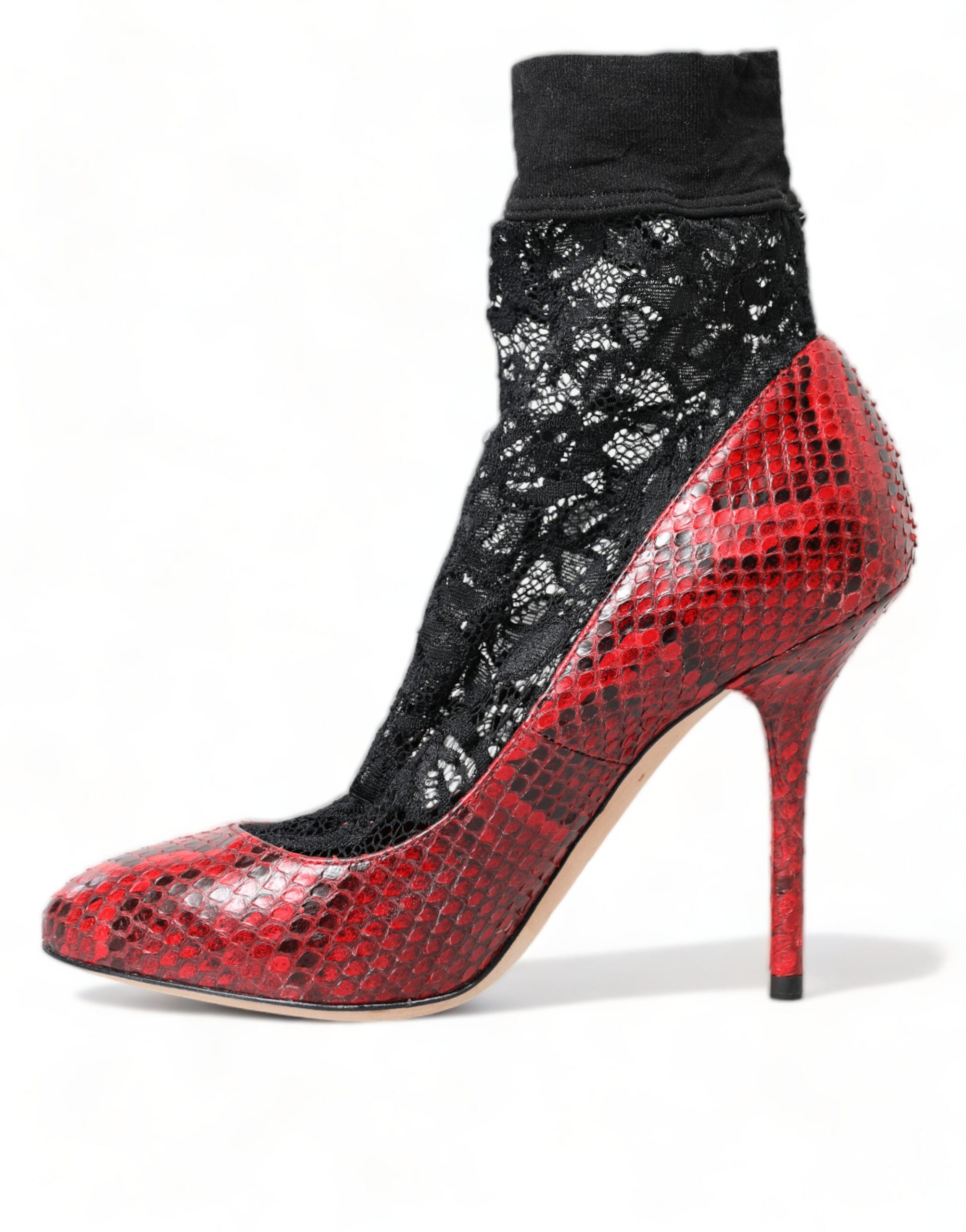 Red leather lace-up pumps shoes by Dolce & Gabbana featuring a sleek design and pointed toe.