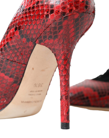 Red leather lace-up sock pumps by Dolce & Gabbana with sleek design and pointed toe, showcasing stylish footwear craftsmanship.