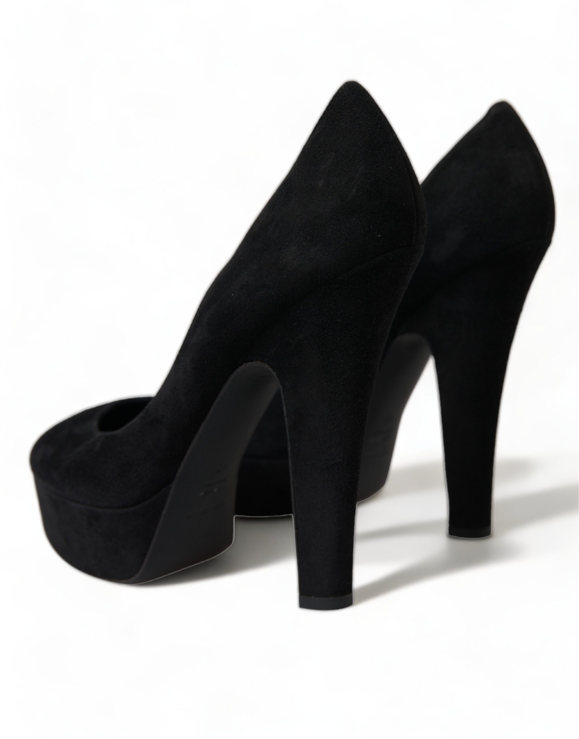 Black suede leather platform heel pumps shoes by Dolce & Gabbana with high stiletto heel and sleek design.