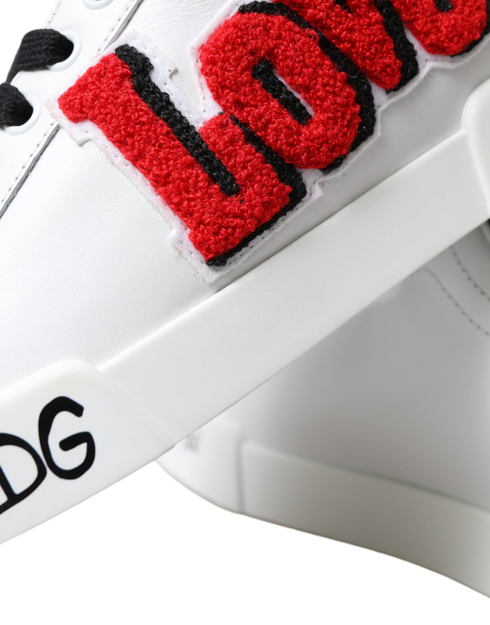 White Dolce & Gabbana Love Patch Portofino Classic Sneakers showing white leather shoes with love patch details and casual lace-up design.