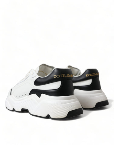 White and black Dolce & Gabbana low-top Daymaster sneakers with sleek design and comfortable fit.