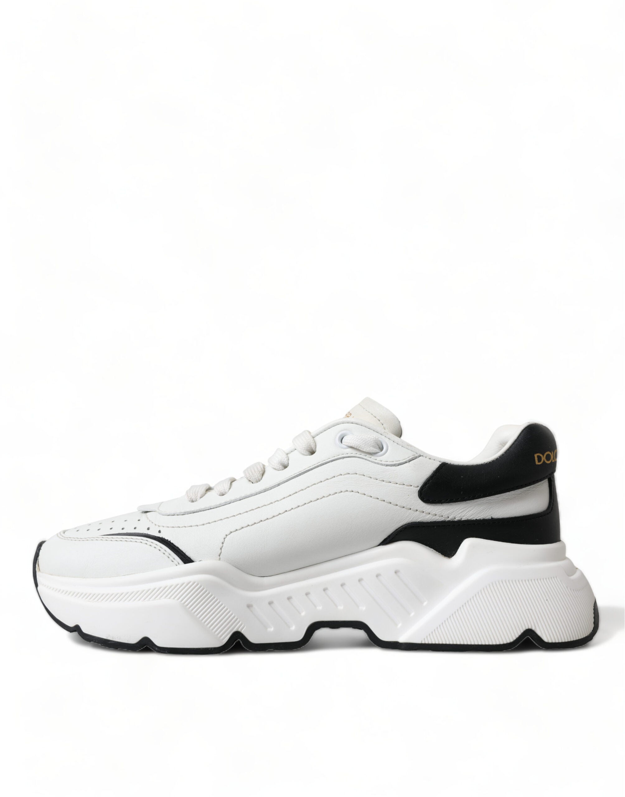 White and black Dolce & Gabbana low-top Daymaster sneakers with sleek design and lace-up closure.