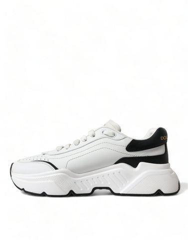 White and black Dolce & Gabbana low-top Daymaster sneakers with sleek design and lace-up closure.