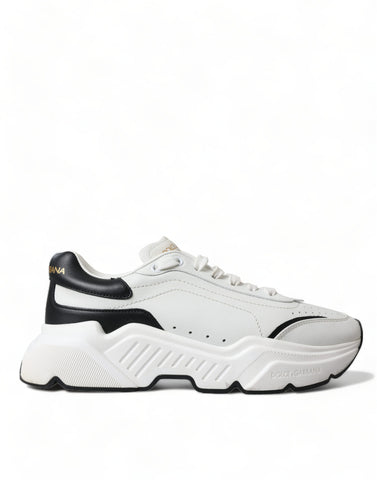 White and black low-top Daymaster sneakers by Dolce & Gabbana with sleek design and laced closure.
