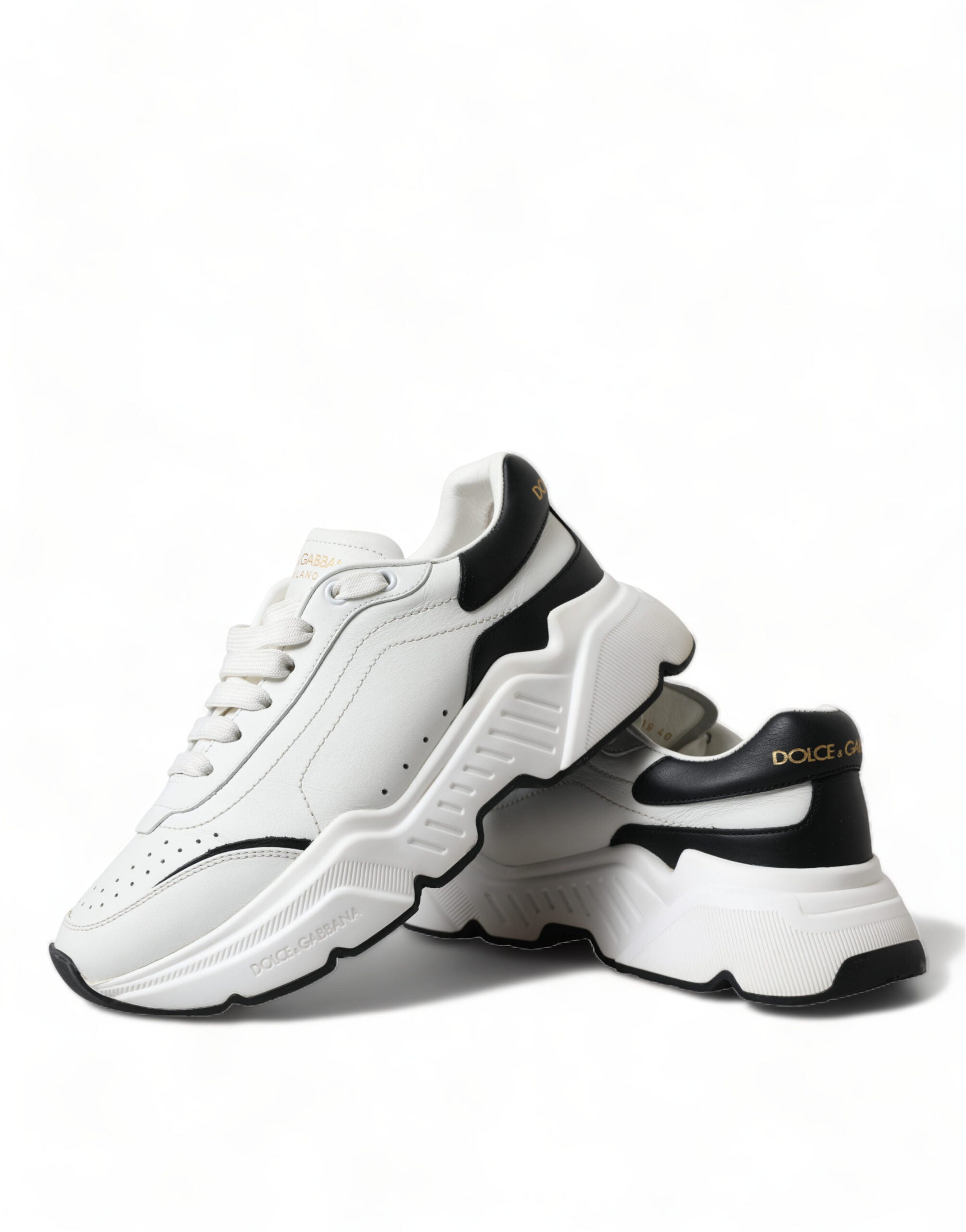 White and black Dolce & Gabbana low-top Daymaster sneakers with sleek design and casual style.