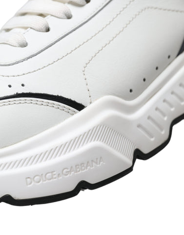 White and black Dolce & Gabbana low-top Daymaster sneakers with sleek design and branded logo on the side.