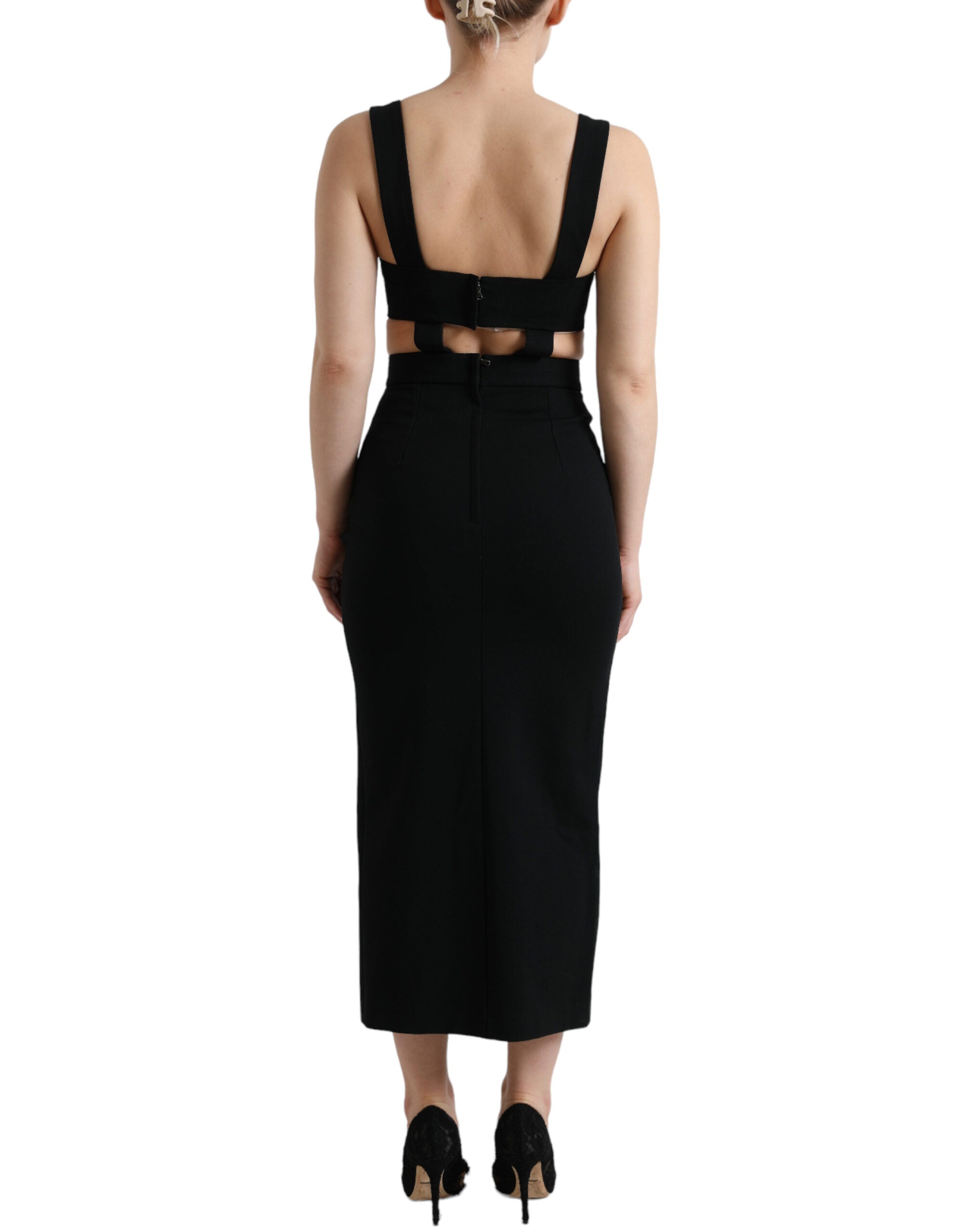 Dolce & Gabbana black sleeveless cut-out bodycon midi dress, form-fitting with stylish cut-out details, perfect for evening wear.