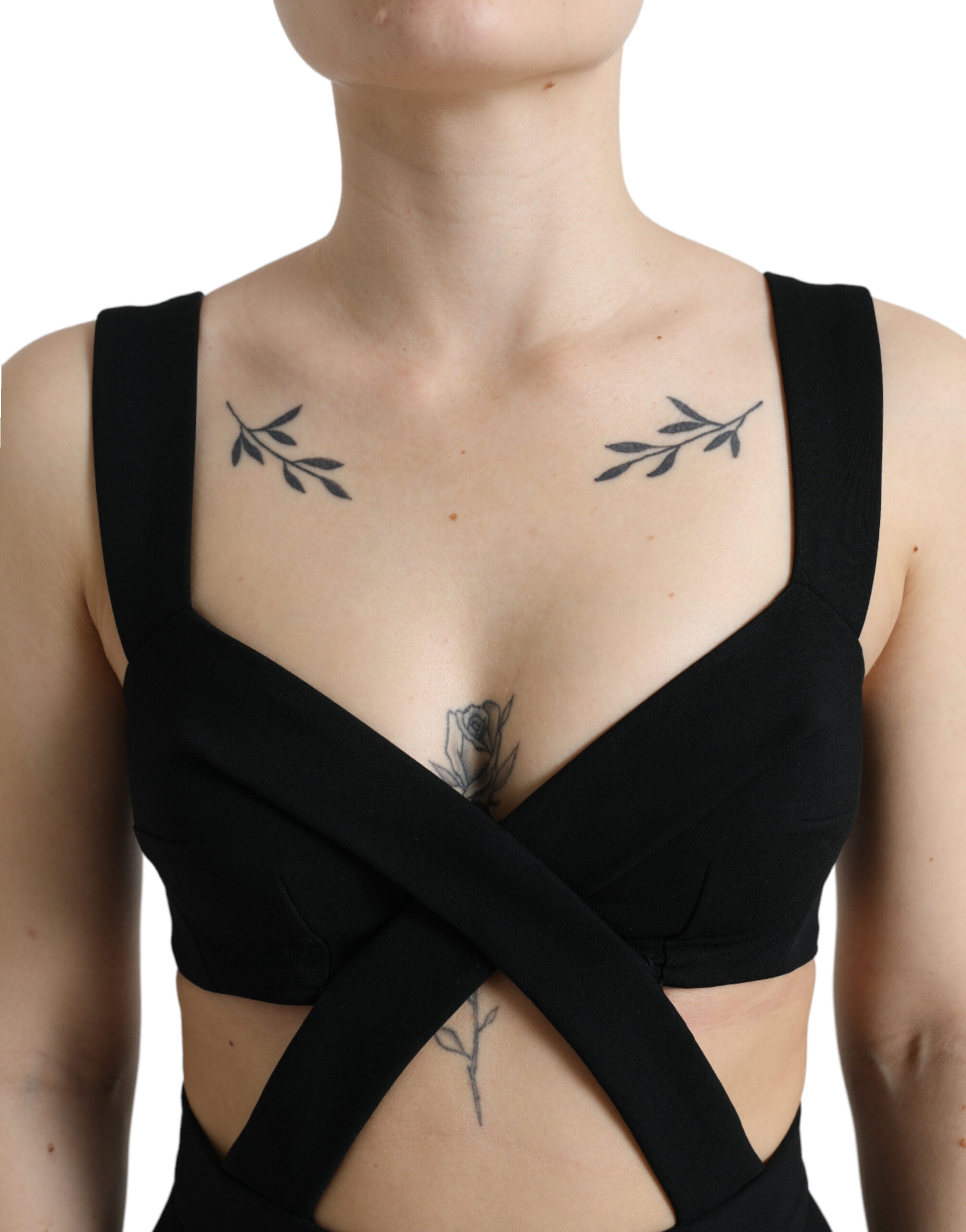 Black cut-out sleeveless bodycon midi dress by Dolce & Gabbana, showing fitted silhouette and stylish design details.