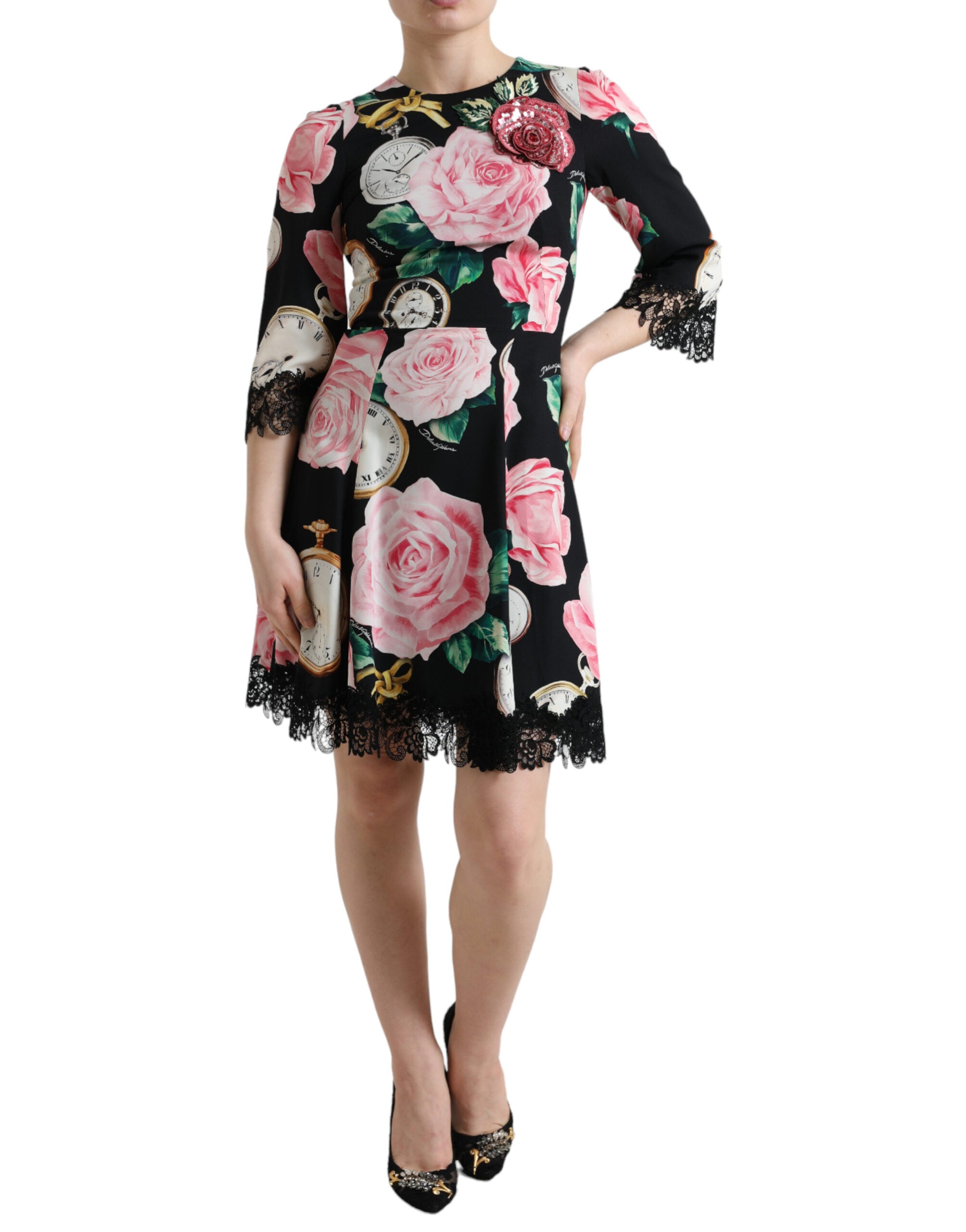 Black floral embellished lace A-line dress by Dolce & Gabbana with intricate floral embroidery and elegant lace details.