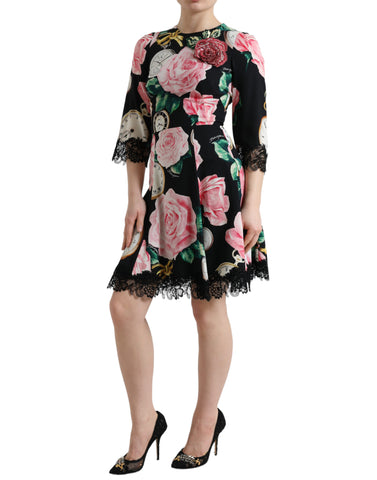 Black floral embellished lace A-line dress by Dolce & Gabbana featuring intricate floral embroidery and elegant lace fabric.
