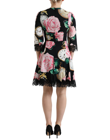 Black floral embellished lace A-line dress by Dolce & Gabbana, featuring intricate floral embroidery and elegant lace fabric.