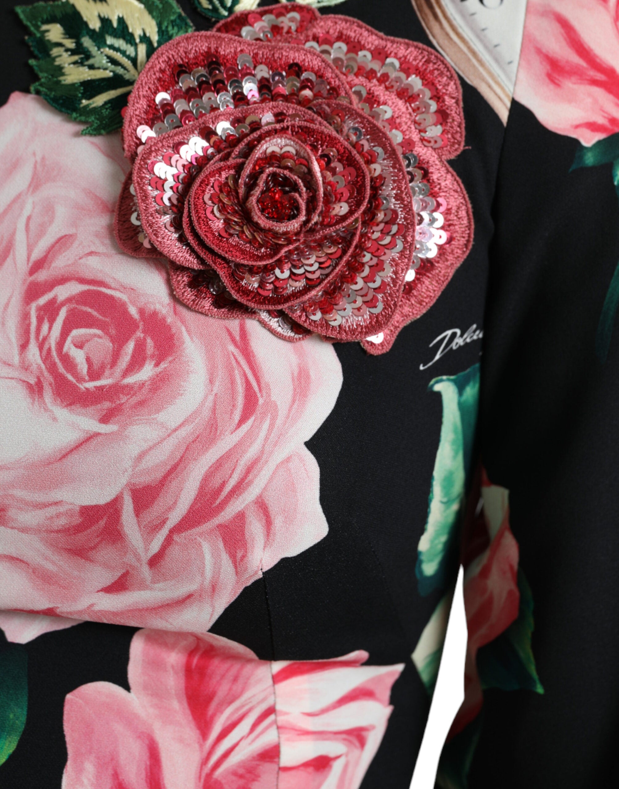 Black floral embellished lace A-line dress by Dolce & Gabbana, featuring intricate floral embroidery and elegant lace fabric.