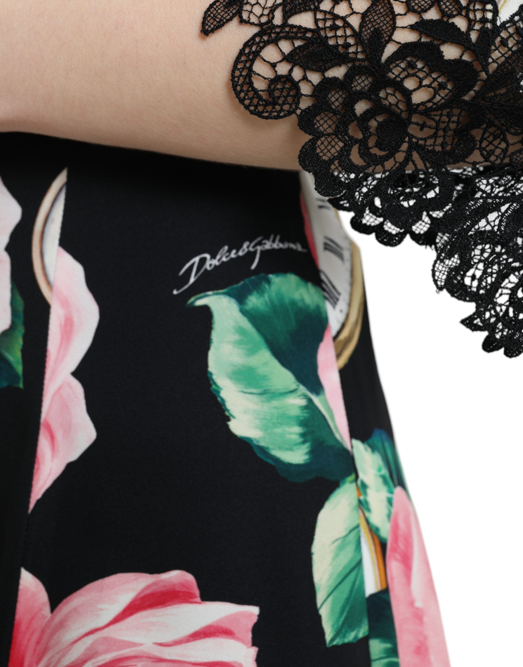 Black floral embellished lace A-line dress by Dolce & Gabbana, featuring intricate floral embroidery and elegant lace fabric.