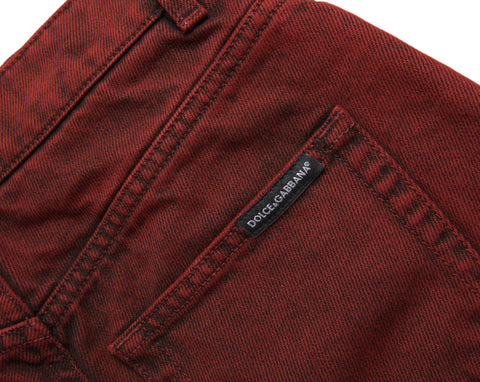 Red high waist denim hot pants shorts by Dolce & Gabbana, featuring stretch fabric and a fitted style.
