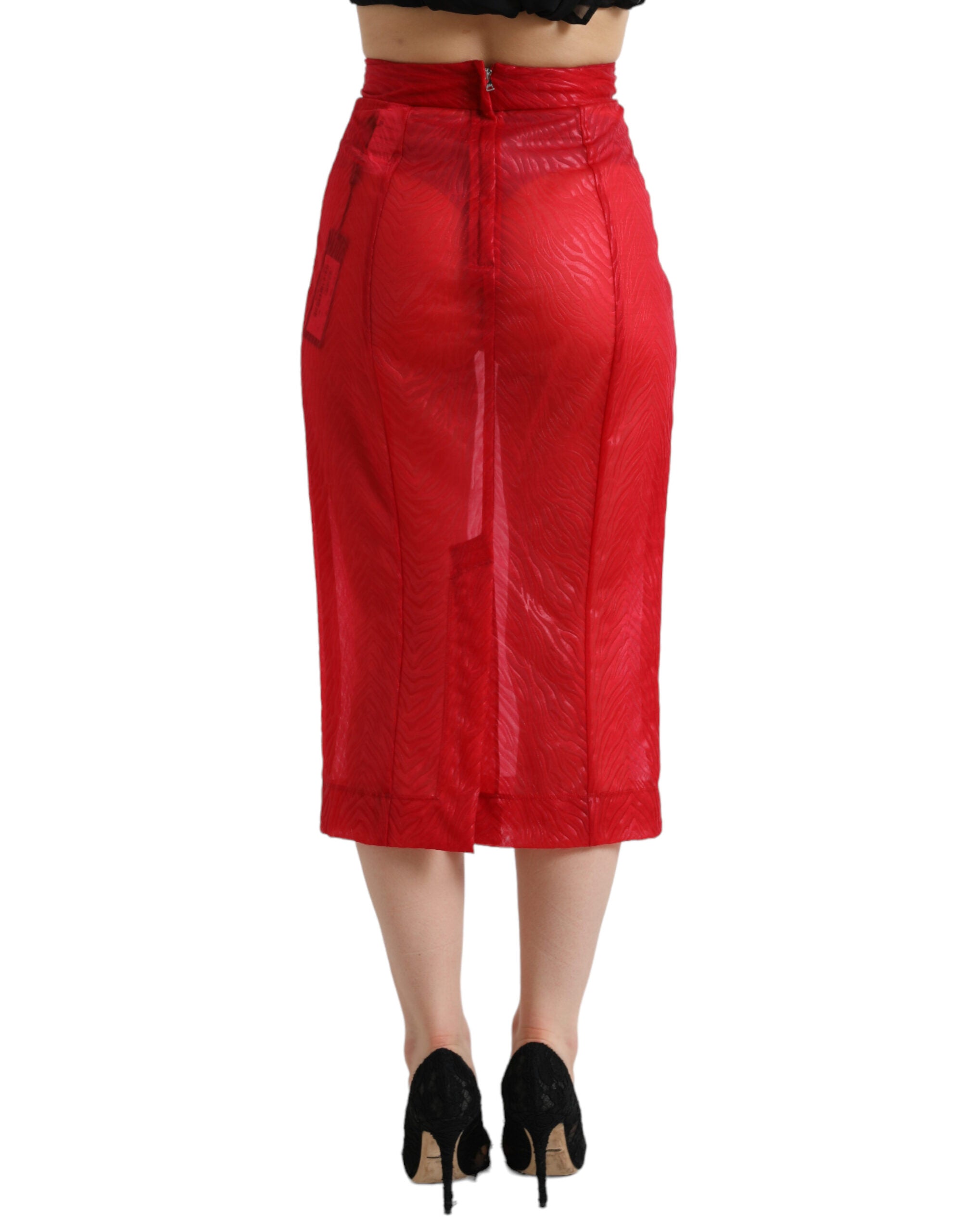 Red sheer high waist pencil cut midi skirt by Dolce & Gabbana, showcasing a fitted silhouette and elegant design.