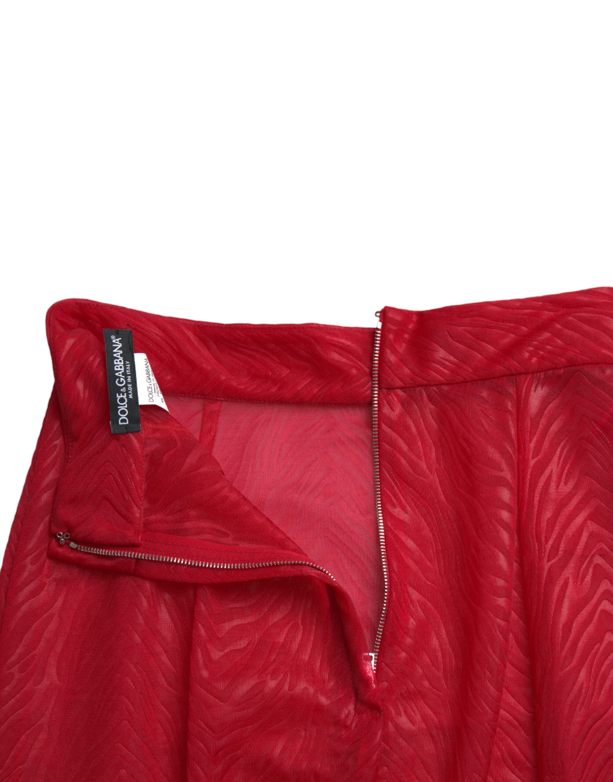 Red sheer high waist pencil midi skirt by Dolce & Gabbana, featuring a fitted silhouette and elegant midi length.