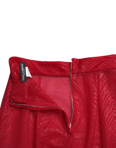Red sheer high waist pencil midi skirt by Dolce & Gabbana, featuring a fitted silhouette and elegant midi length.