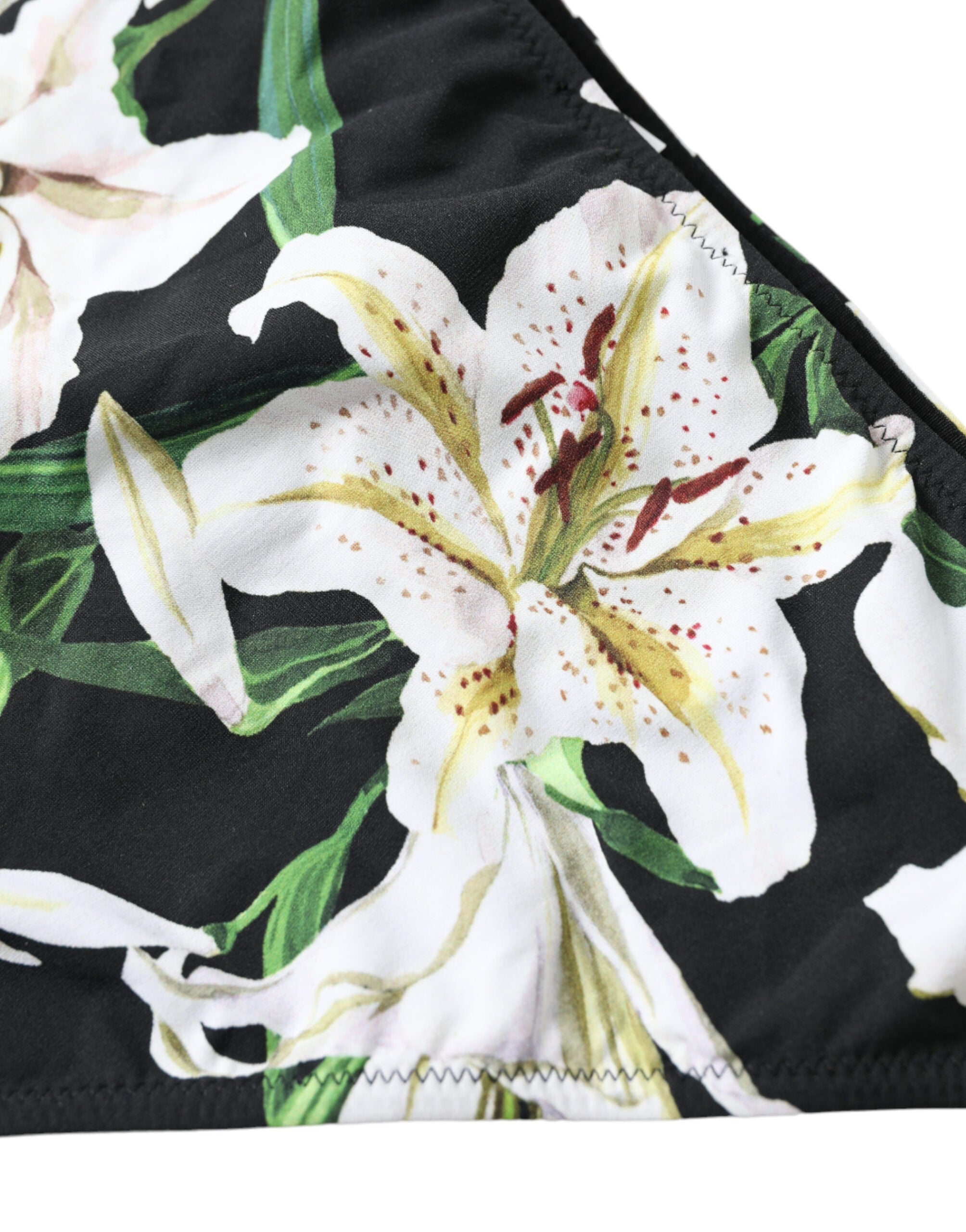 Black lily print swimwear bottom by Dolce & Gabbana featuring a stylish bikini design for beachwear.