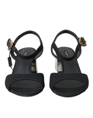 Black Crystals ankle strap sandals by Dolce & Gabbana with crystal embellishments and open toe design.