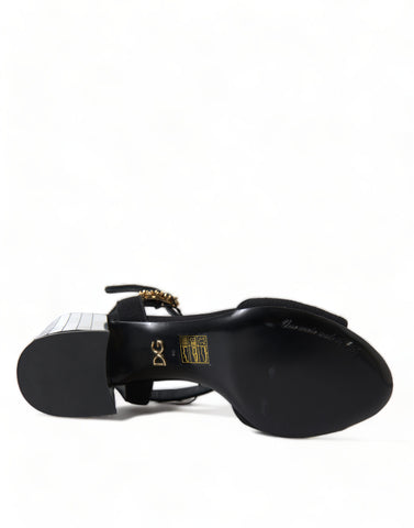 Black Crystals ankle strap sandals by Dolce & Gabbana with sparkling crystal embellishments and open toe design.